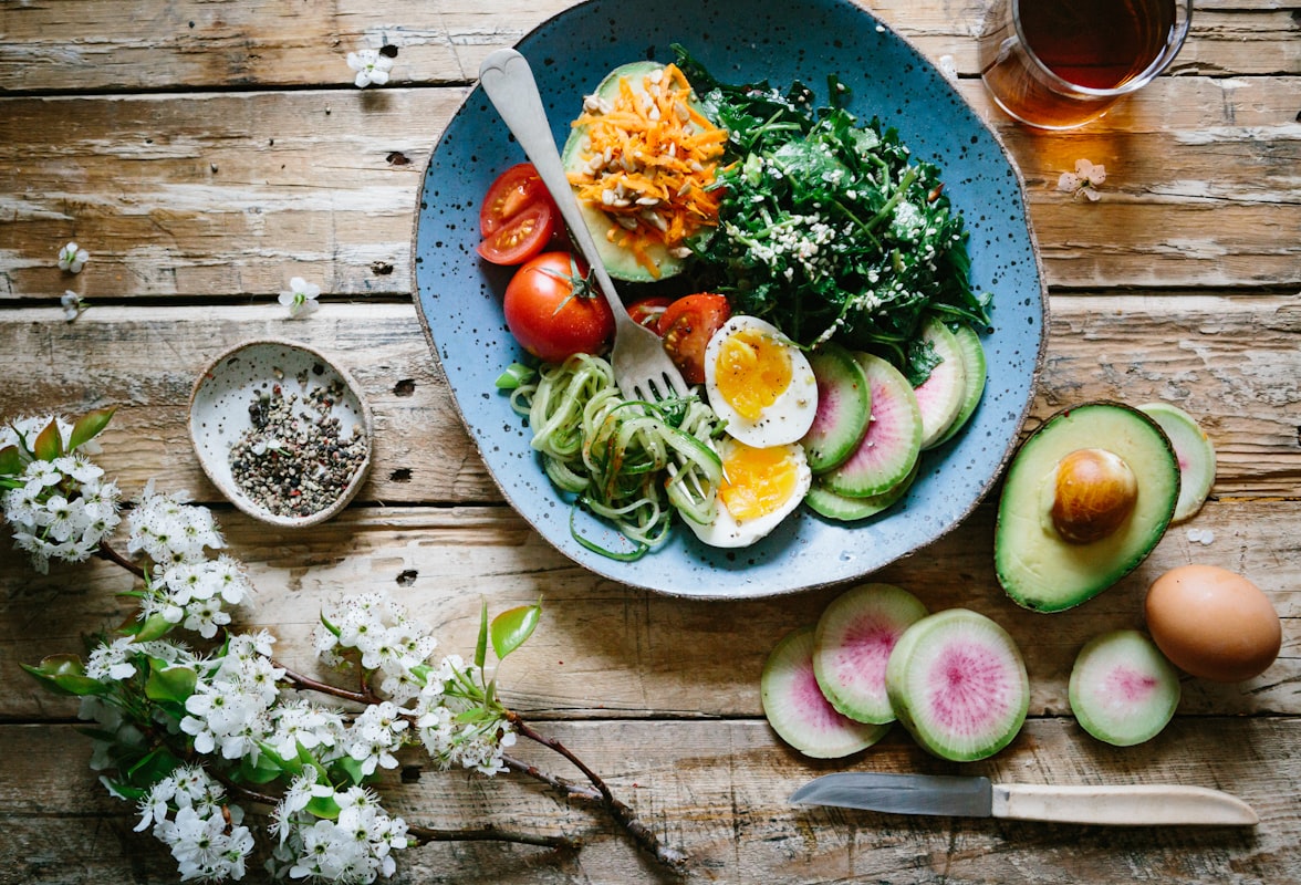 Person preparing healthy meals in kitchen